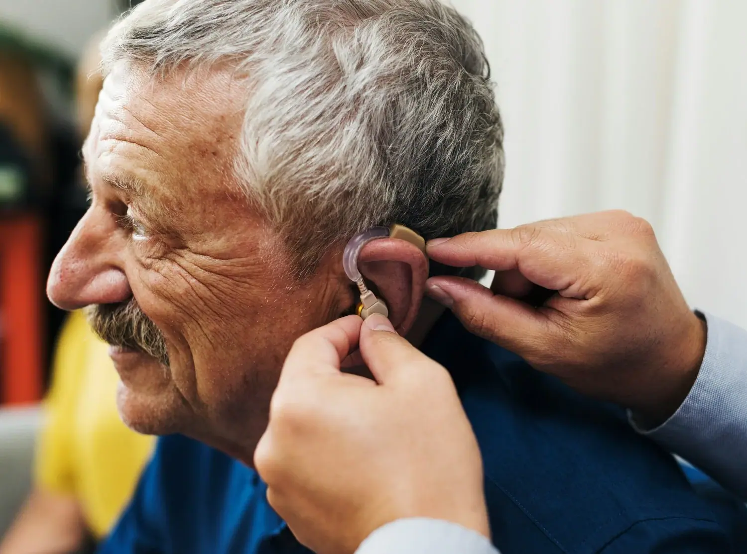 local audiologist helping patient at 3D Hearing Pasadena